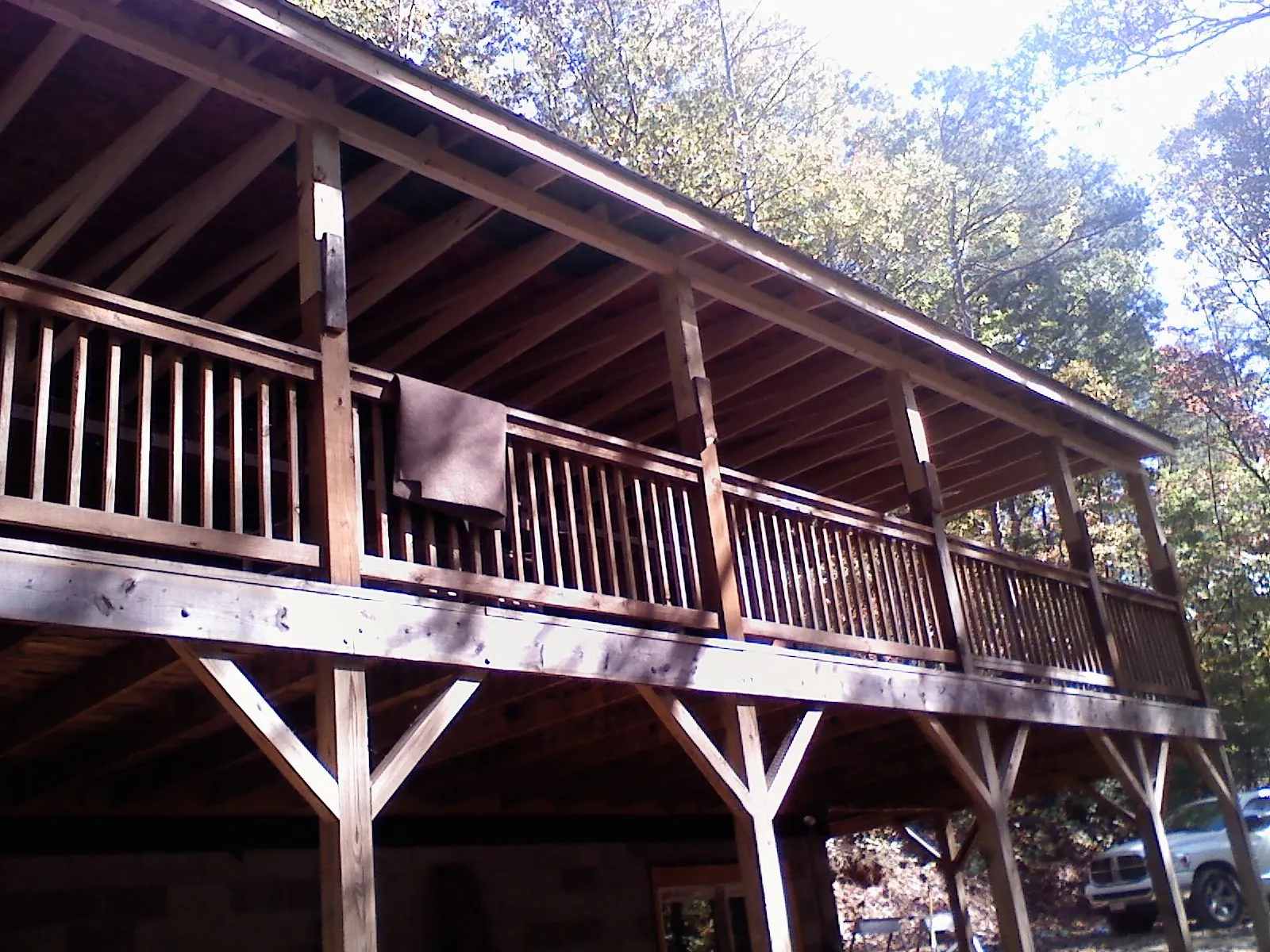 Timber framing under a new elevated porch and deck — Roof Leak Repair in Hedgesville by Roofing Brothers
